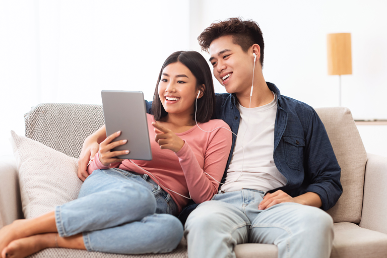 cheerful asian couple using digital tablet browsin 2021 08 29 10 49 39 utc.jpg